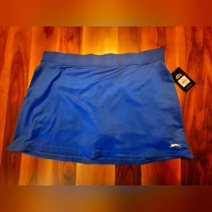 Brand new slazenger tennis/golf skort. Royal Blue and lime green, size XL